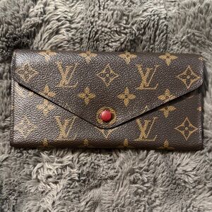Louis Vuitton Monogram Envelope Wallet in Brown with Red Snap Closure